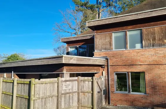 Falcons Rest and Poachers Cottage - An outside view of the home