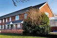 Yew Trees - An outside view of the home
