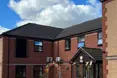 Holmwood Nursing Home - An outside view of the home