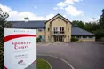 OSJCT Spencer Court - An outside view of the home